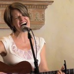 Amy Soucy plays guitar on her original tunes from her debut CD at Out by 110. Out by 10